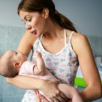 Baby and mother in hospital. New life concept.